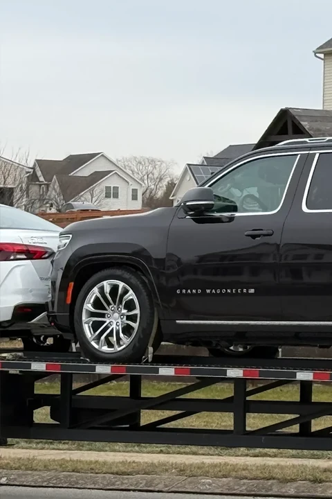 Cars on a truck ready for door-to-door shipping